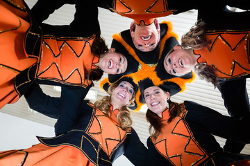Costumed girls with tricorns from carnival club during Carnival