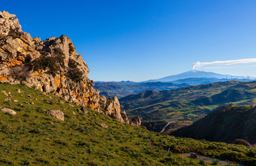 Sicilian countryside with Etna volcano in the background