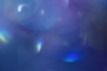 Blue abstract blurred shiny glitter lamp lights background.