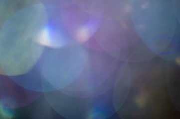 Obraz premium Abstract blurred shiny glitter lamp lights background.