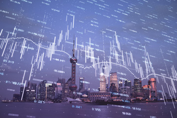 Forex chart on cityscape with tall buildings background multi exposure. Financial research concept.