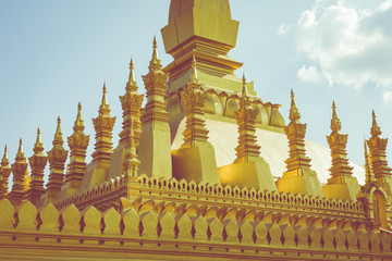 Fototapeta premium Pha That Luang temple - The Golden Pagoda in Vientiane , Laos