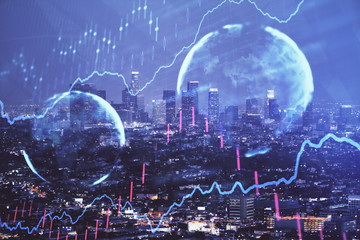 Financial graph on night city scape with tall buildings background double exposure. Analysis concept.