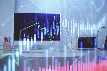 Forex Chart hologram on table with computer background. Multi exposure. Concept of financial markets.