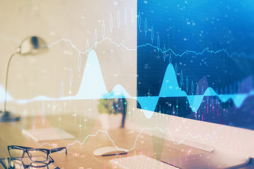 Forex Chart hologram on table with computer background. Multi exposure. Concept of financial...