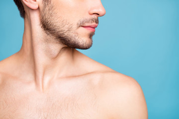Cropped photo of naked attractive handsome man with face unshaven isolated over pastel blue color...