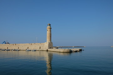Old lighthouse near the harbor of Rethymno, Crete, Greece.