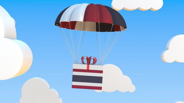 Carton with flag of Thailand falls with a parachute. Loopable conceptual 3D animation