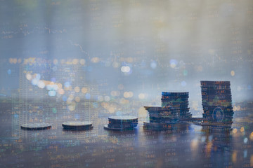 Double exposure of Money coin stack growing graph with bokeh light background,investment concept. plant growing on coin, business finance and save money concept.