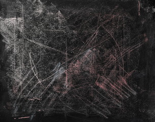 Black chalkboard, blackboard with chalk stains and scribbles background and texture