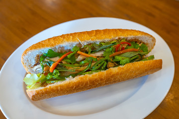 Crispy Vietnamese shredded chicken meat sandwich- Banh Mi