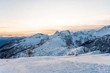 Spectacular winter mountain panoramic view of mountains at sunset.