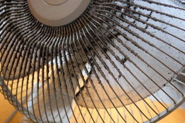 Dust on front grills dirty of electric fan, air pollution