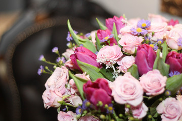 Bouquet of pink roses and tulips stock photo. Gift cards. Beautiful background flowers, roses and tulips. Greeting card, decoration for party.