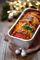 English fruit cake with dry fruits on ceramic background