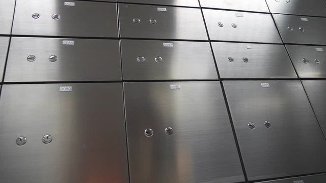 Moving shot Metal safe box panel wall. Concept for security and banking protection.
