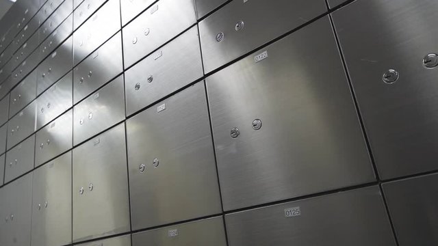 Moving shot Metal safe box panel wall. Concept for security and banking protection.