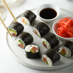 Homemade maki sushi with salmon