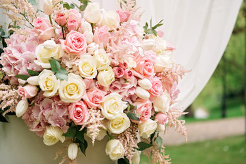 Wedding decorations with flowers. Close-up. Soft focus.