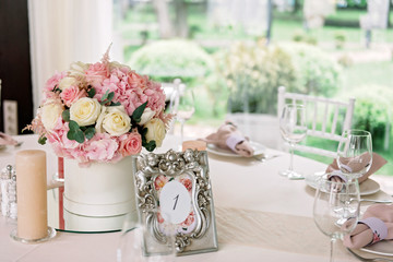 Table decor with flowers for a wedding party.