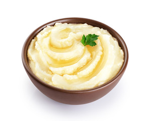 Mashed potatoes with butter and parsley isolated on white background.