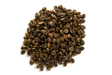 roasted coffee beans lie on a white background. Isolate