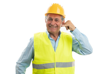 Builder making call gesture