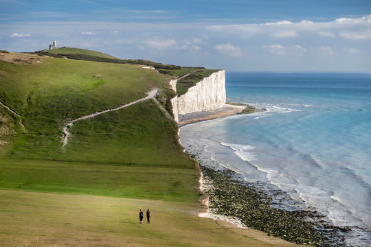 walkers at the Birling gap