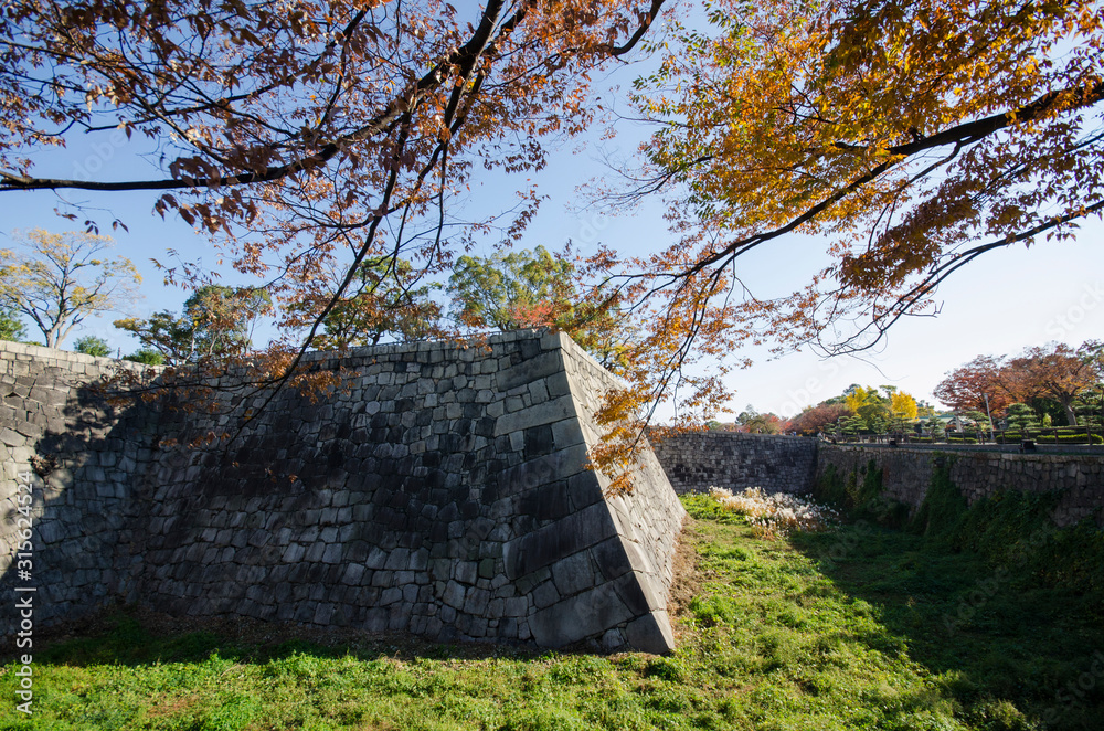 Poster Wall outside of Osaka castle is historic landmark in Osaka