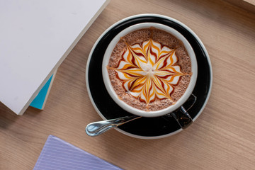 coffee and book on a table, coffee art,  latte art, coffee background