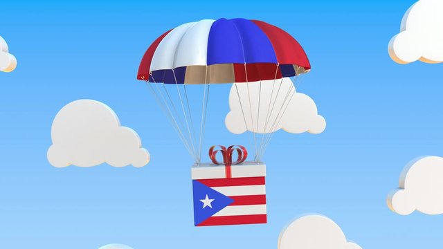 Box with national flag of Puerto Rico falls with a parachute. Loopable conceptual 3D animation