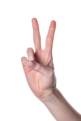 Woman hand showing victory sign isolated on white background