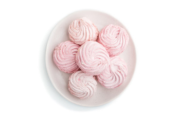 Pink strawberry homemade zephyr or marshmallow isolated on white background. top view.