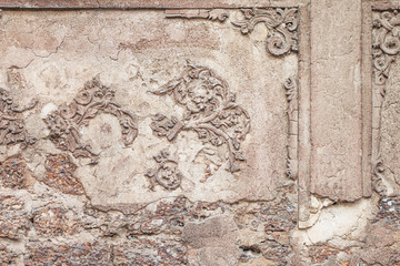 Fototapeta na wymiar Ancient stucco patterns at ancient buildings.