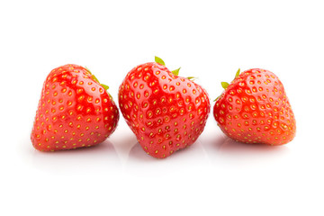 three red strawberry isolated on white background. side view.
