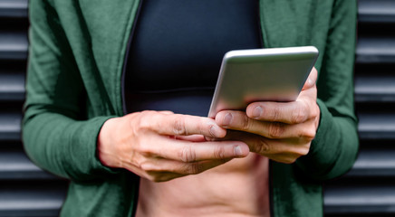 Woman's hands with chewed nails