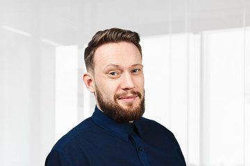Obraz premium man with beard smiling. Portrait Businessman of handsome adult man