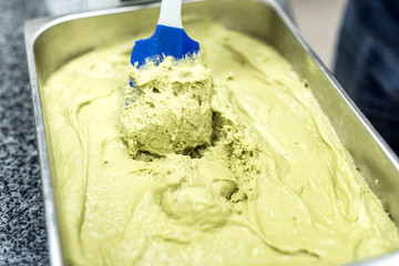 pistachio paste macro detailed texture.Blurred image. Components for cooking
