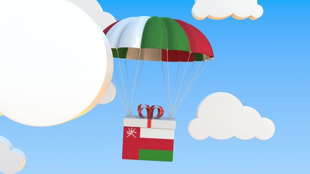 Box with national flag of Oman falls with a parachute. Loopable conceptual 3D animation