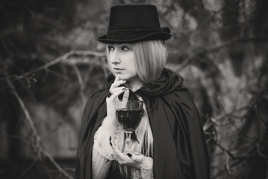 Aristocratic vampire cosplay, victorian gothic style. Halloween or masquerade ideas