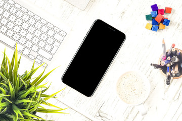 iPhone X on desk top view