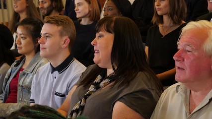 4K: Crowd applause - Group of people in Audience clapping hands indoors in a hall / auditorium - Stock 4K Video Clip Footage