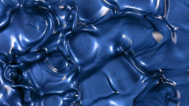 Super Slow Motion Shot of Blue Metallic Color Background at 1000fps.