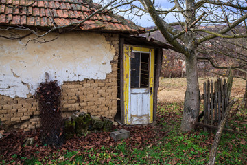 Fototapeta na wymiar Old abandoned rural farmhouse ruin