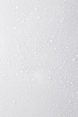 drops of water on a white surface