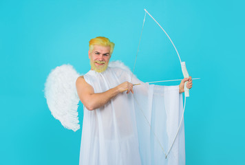 Valentines Day concept. Valentines day cupid. Male angel with bow and arrow. Cupid angel with bow...