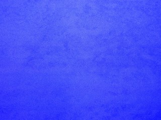 Bright blue craft foamy paper photo background.