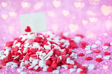 Empty blank in the heap red and white hearts on shiny pink bokeh background. Valentine day concept.