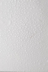 drops of water on a white surface