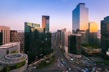 Seoul city Skyling and Skyscraper and Traffic at intersection in Gangnam, South Korea.